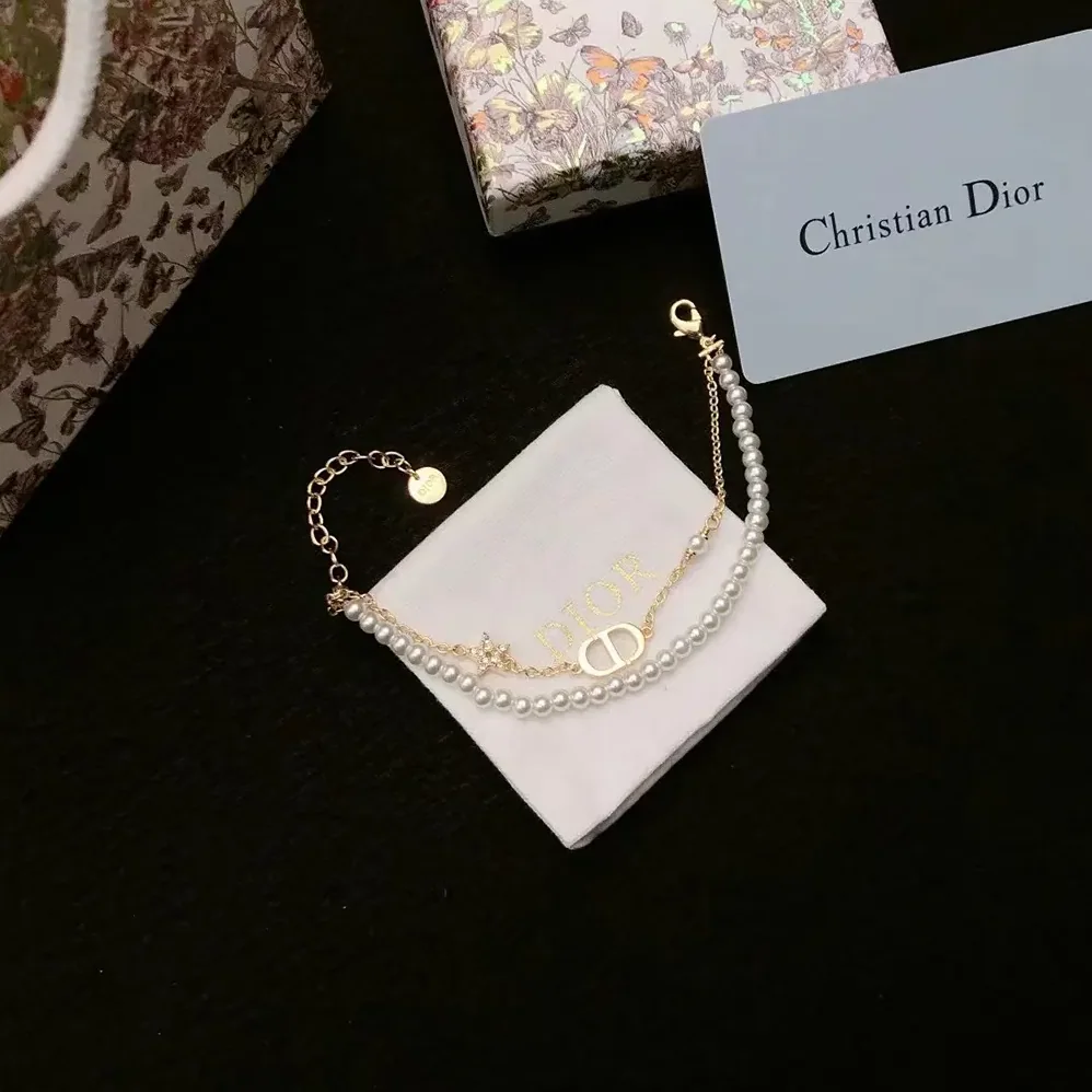 Dior Petit CD Bracelet Gold-Finish Metal with White Resin Pearls and Silver for Women in Tone Crystals Dior Petit CD Bracelet Gold-Finish Metal with White Resin Pearls and Silver for Women in Tone Crystals