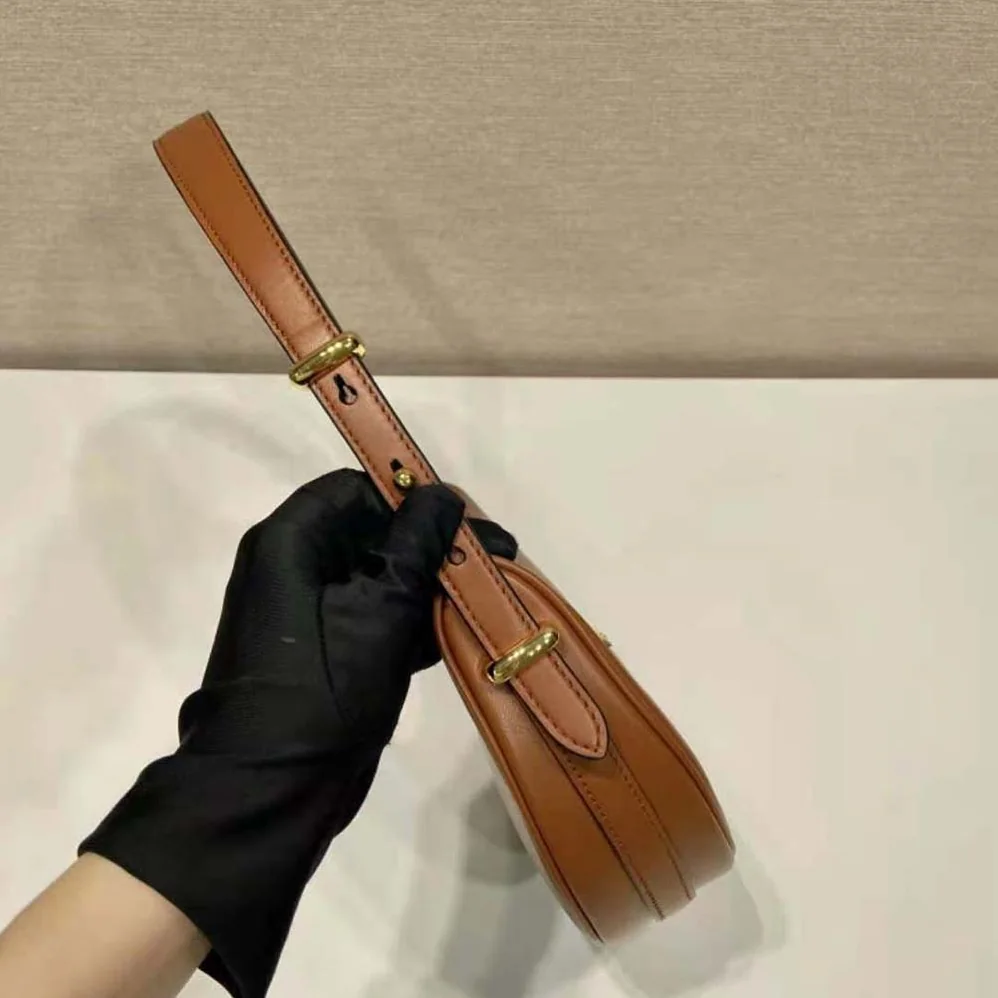 Prada Leather Shoulder Bag with Enameled Metal Triangle Logo for Women in Brown Prada Leather Shoulder Bag with Enameled Metal Triangle Logo for Women in Brown