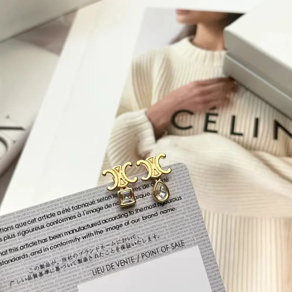 Celine Triomphe Twinkle Earrings in Strass and Brass with Gold Finish for Women