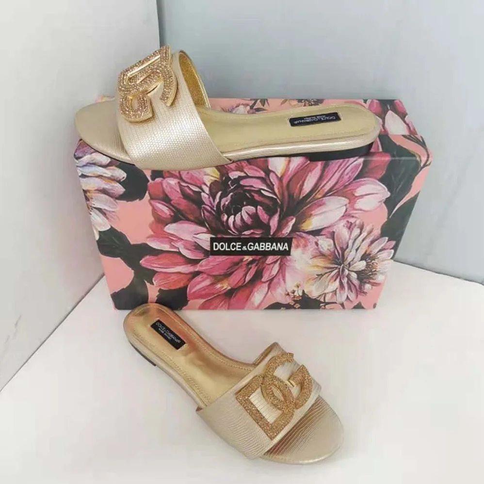 Dolce Gabbana D&G Foiled Iguana-Print Calfskin Slides with Rhinestone for Women in Detailed DG Logo Dolce Gabbana D&G Foiled Iguana-Print Calfskin Slides with Rhinestone for Women in Detailed DG Logo