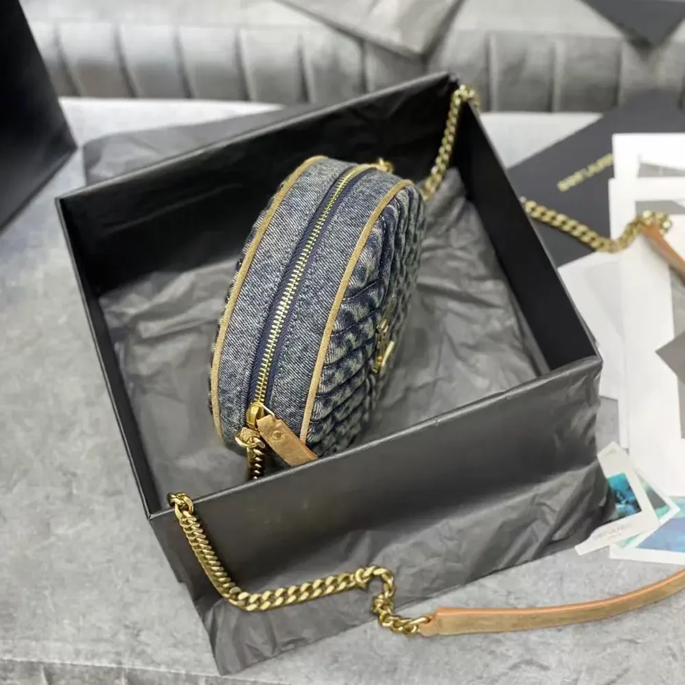 Saint Laurent YSL Logo-Plaque Round Crossbody Bag for Women in Navy Saint Laurent YSL Logo-Plaque Round Crossbody Bag for Women in Navy