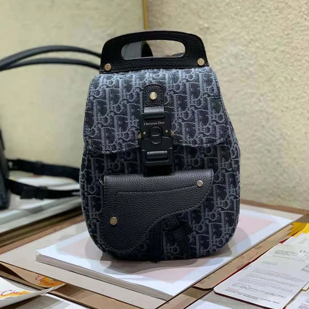 Dior Mini Saddle Backpack Dior Oblique Jacquard for Men in Black Dior Mini Saddle Backpack Dior Oblique Jacquard for Men in Black