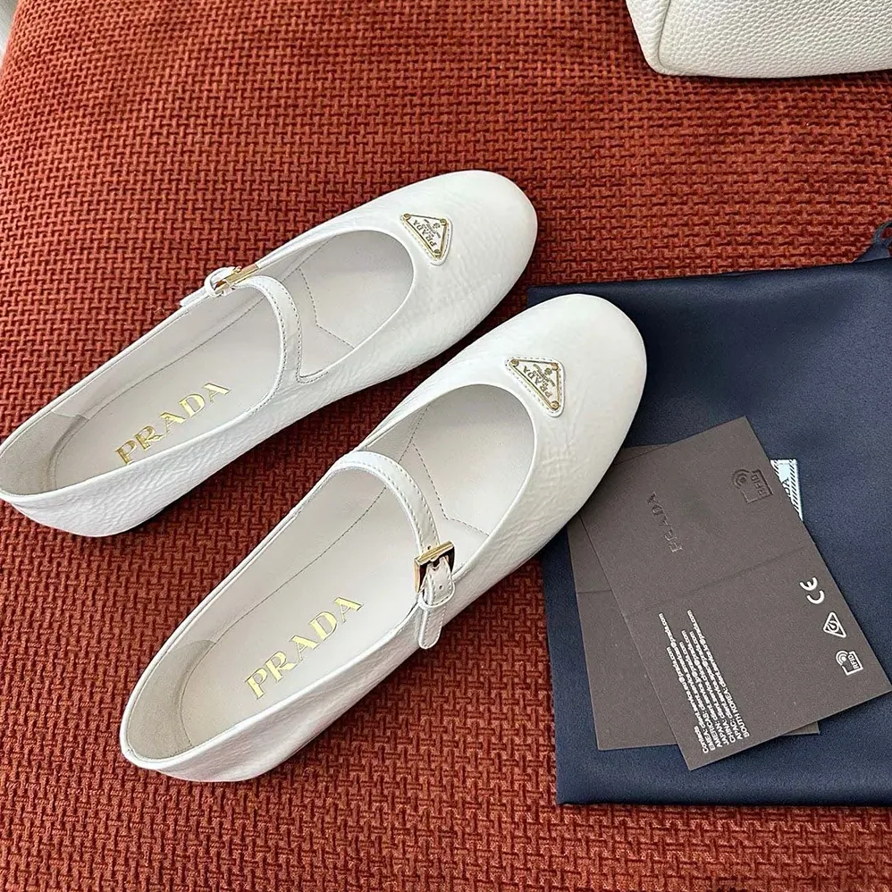 Prada Naplak Patent Leather Ballerinas for Women in White Prada Naplak Patent Leather Ballerinas for Women in White
