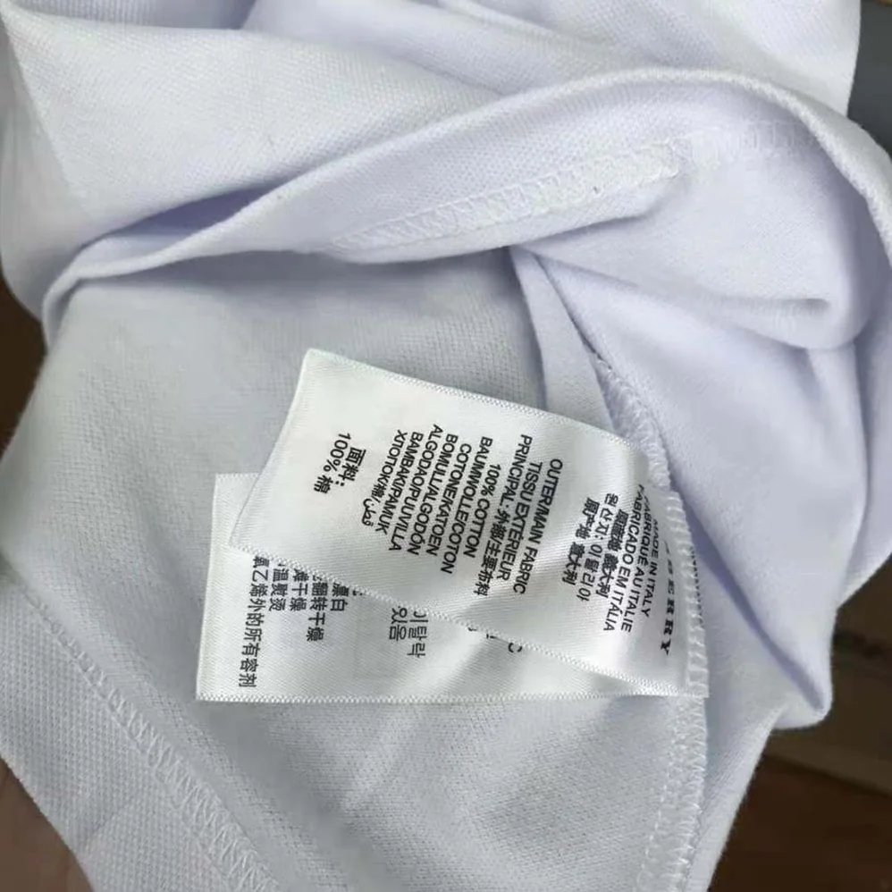 Burberry Girls' Vintage Check Trim Cotton Piqué Polo Shirt Dress in White Burberry Girls' Vintage Check Trim Cotton Piqué Polo Shirt Dress in White