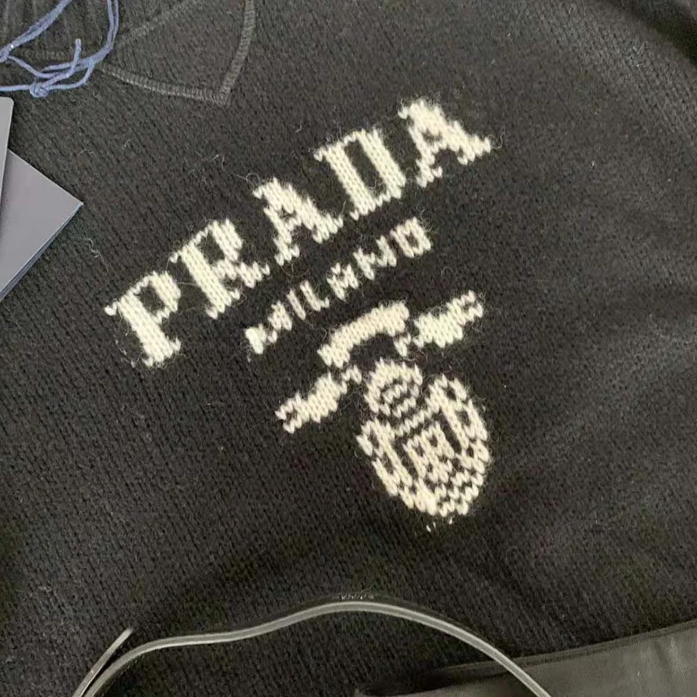Prada Cashmere and Wool Prada Logo Crew-Neck Sweater for Women in Black Prada Cashmere and Wool Prada Logo Crew-Neck Sweater for Women in Black