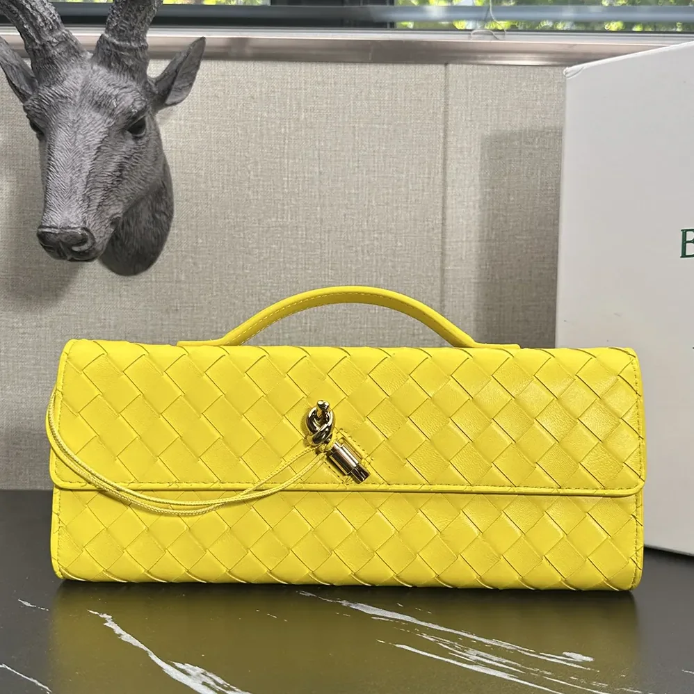 Bottega Veneta Andiamo Clutch in Intrecciato Leather for Women in Yellow Bottega Veneta Andiamo Clutch in Intrecciato Leather for Women in Yellow