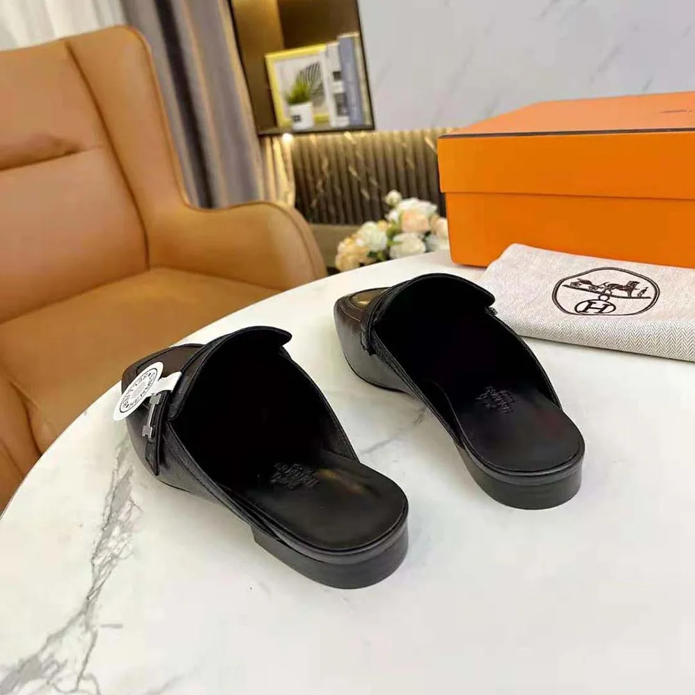 Hermes Groupie Mule in Goatskin with Miniature Palladium-Plated Paris Buckle for Women in Black