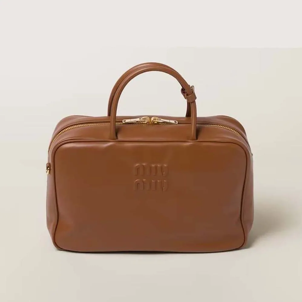 Miu Miu Leather Top-handle Bag with Embossed Lettering Logo for Women in Brown Miu Miu Leather Top-handle Bag with Embossed Lettering Logo for Women in Brown
