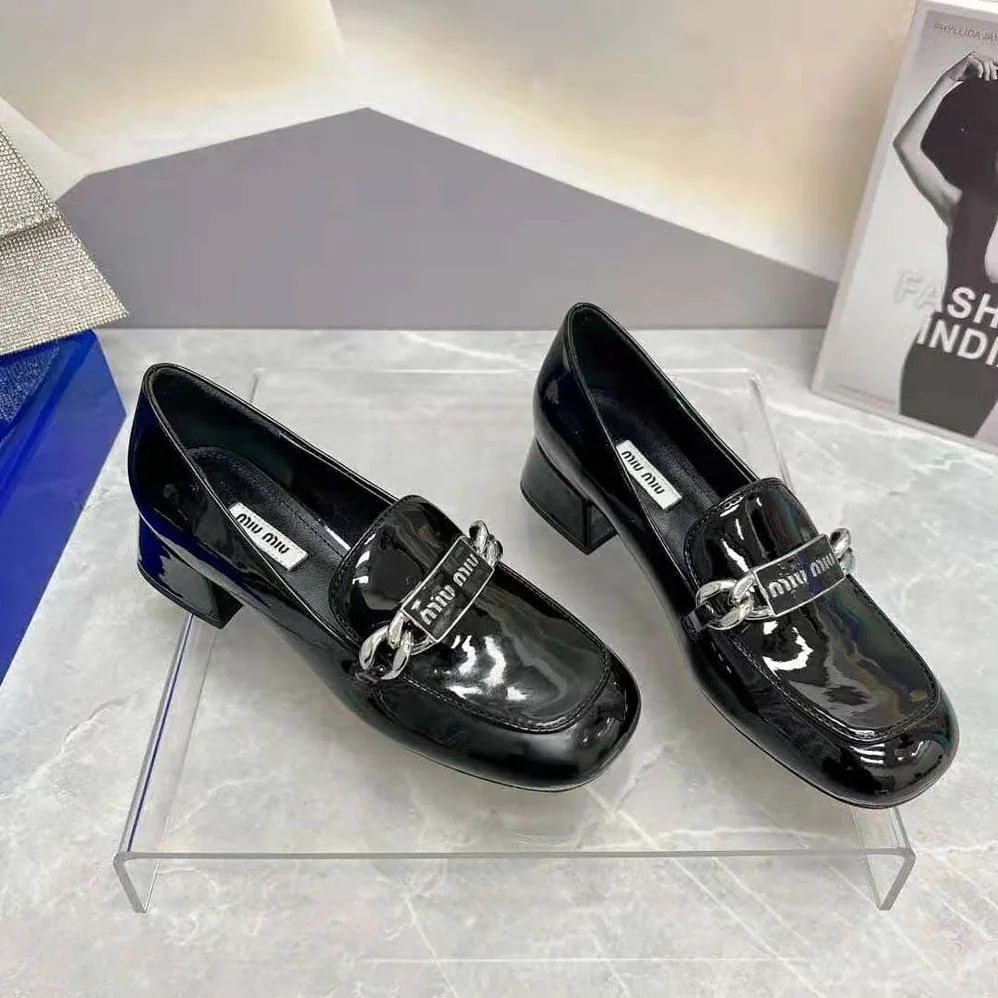 Miu Miu Patent Leather Loafers in 35 mm Heel Height for Women in Black