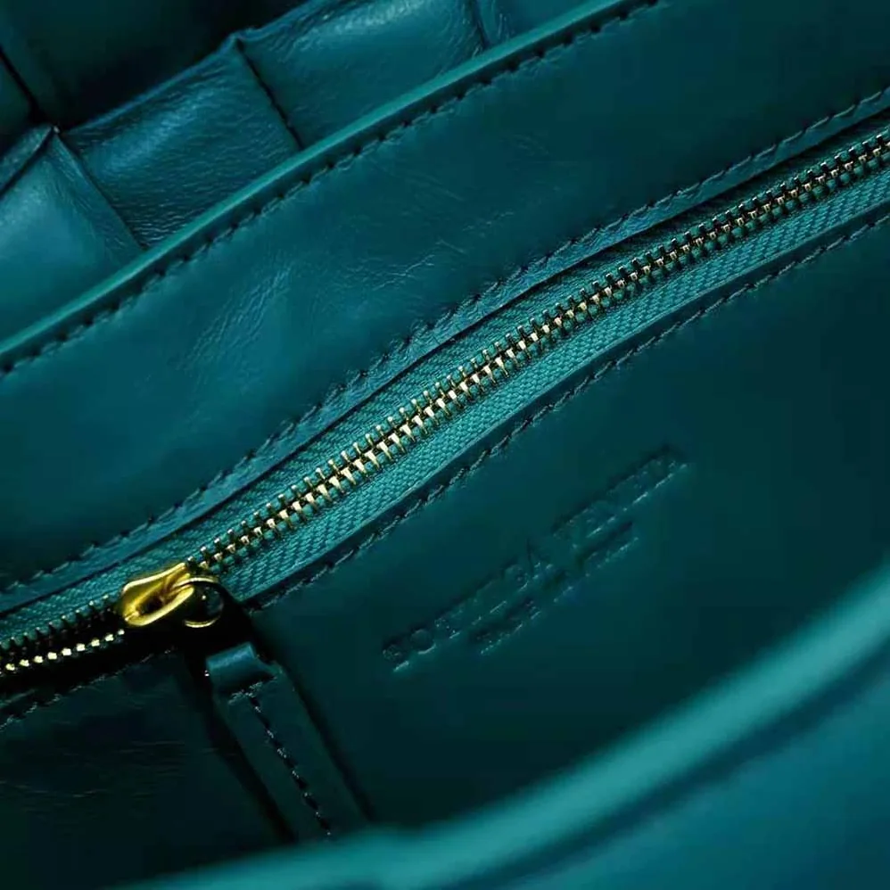 Bottega Veneta Padded Cassette Padded Intreccio Leather Cross-Body Bag for Women in Blue