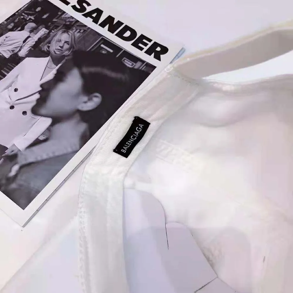 Balenciaga Logo Visor Cap in White and Black Cotton Drill for Women Balenciaga Logo Visor Cap in White and Black Cotton Drill for Women