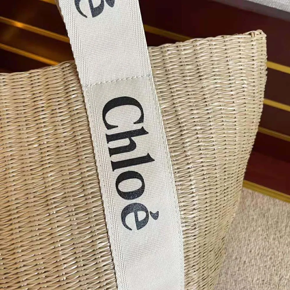 Chloe Large Woody Basket in Fair-Trade Paper with the Woody Ribbon for Women Chloe Large Woody Basket in Fair-Trade Paper with the Woody Ribbon for Women