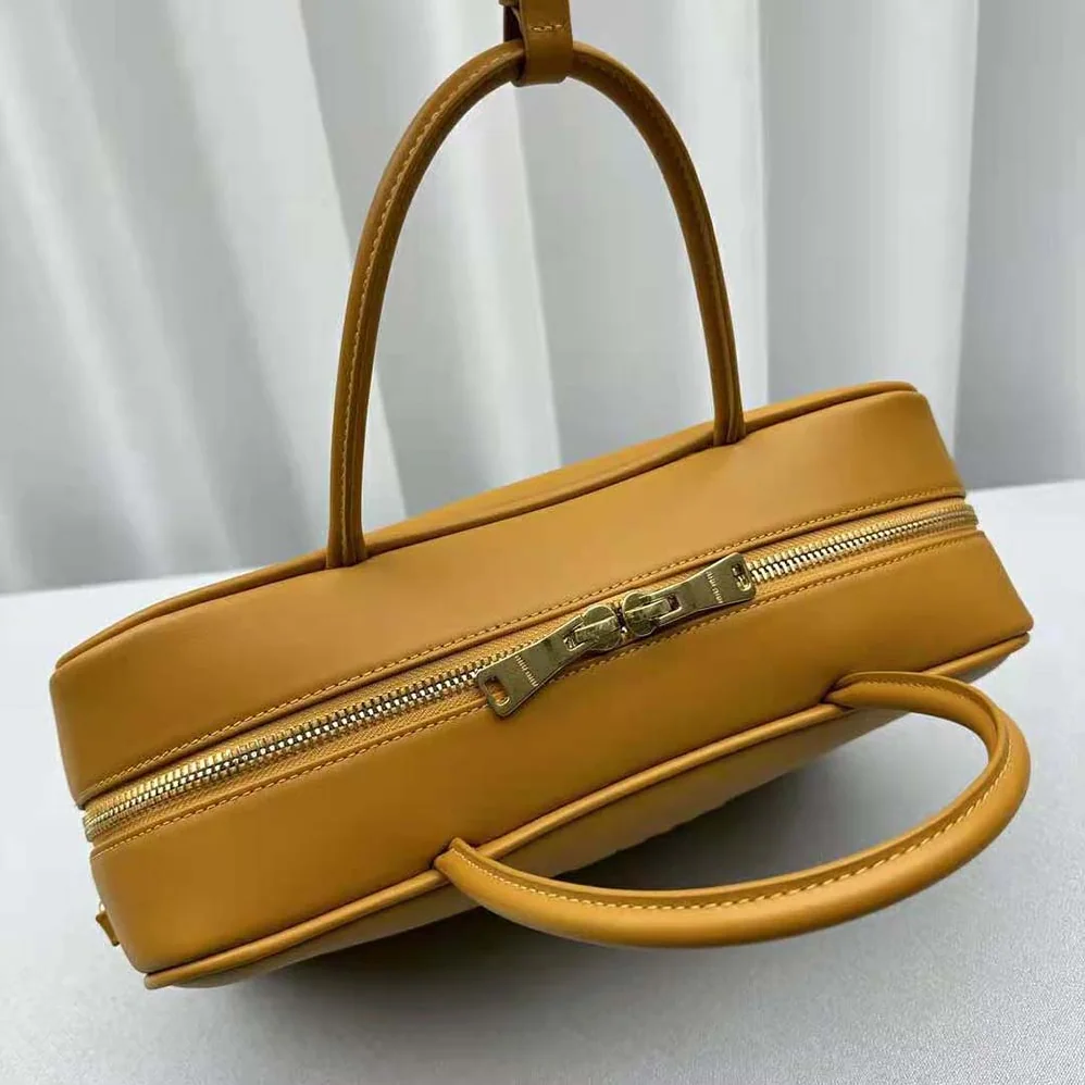 Miu Miu Leather Top-handle Bag with Embossed Lettering Logo for Women in Orange Miu Miu Leather Top-handle Bag with Embossed Lettering Logo for Women in Orange