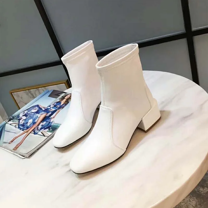 Stuart Weitzman Shoes The Accordion Bootie 40mm Heel for Women in White Stuart Weitzman Shoes The Accordion Bootie 40mm Heel for Women in White