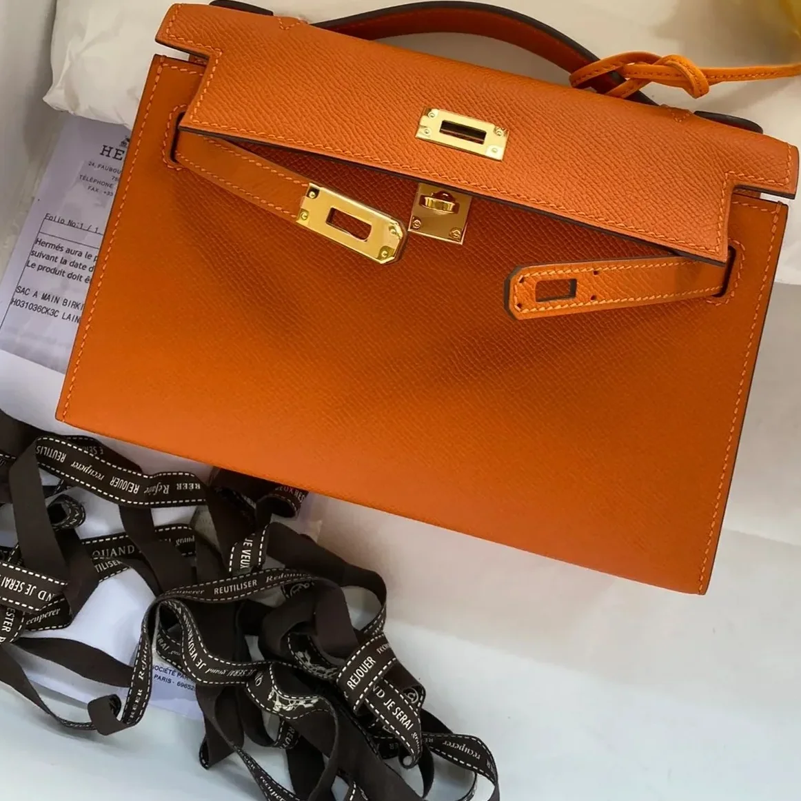 Hermes Kelly Pochette Top Handle Bag in Orange Epsom Gold Hardware