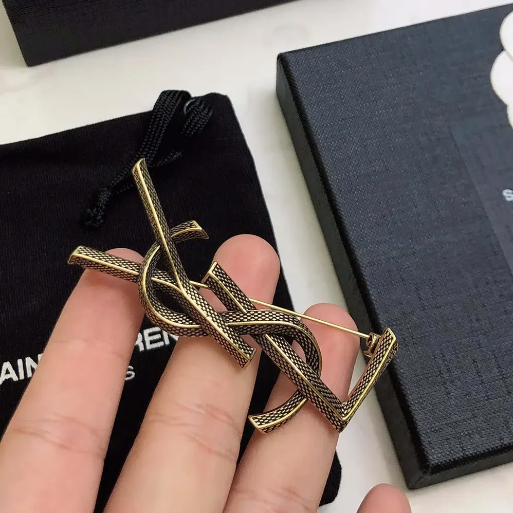 Saint Laurent YSL Cassandre Snake Brooch in Metal for Women