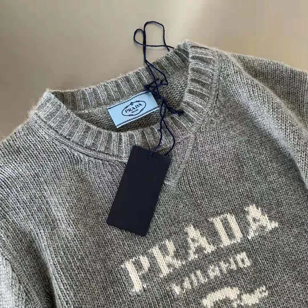 Prada Cashmere and Wool Prada Logo Crew-Neck Sweater for Women in Silver Prada Cashmere and Wool Prada Logo Crew-Neck Sweater for Women in Silver