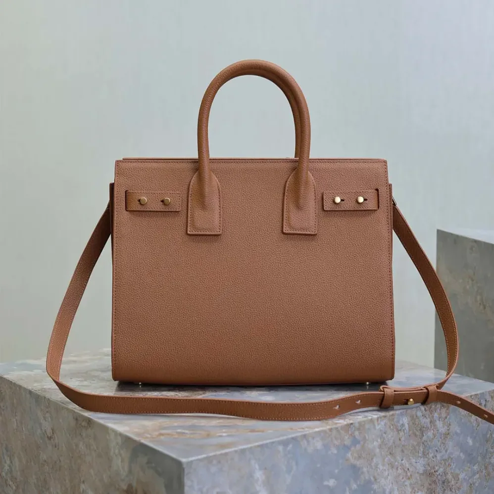 Saint Laurent YSL Baby Sac De Jour In Supple Grained Leather for Women in Brown Saint Laurent YSL Baby Sac De Jour In Supple Grained Leather for Women in Brown