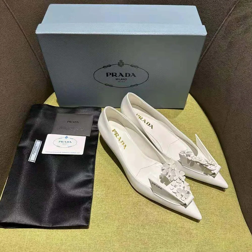 Prada Brushed Leather Pumps with Floral Appliqués for Women in White