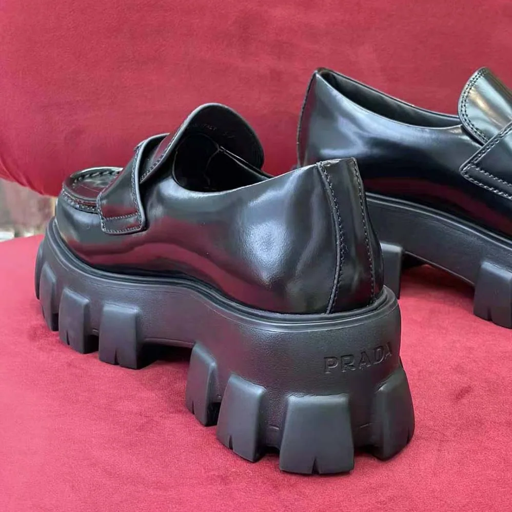 Prada Brushed Leather Monolith Loafers for Unisex in Black