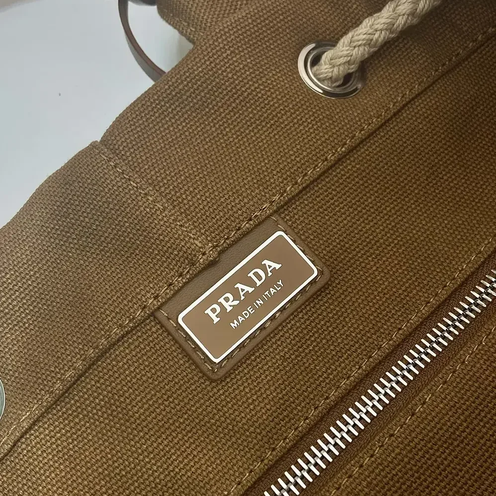 Prada Canvas Drawstring Duffle Bag for Unisex in Brown