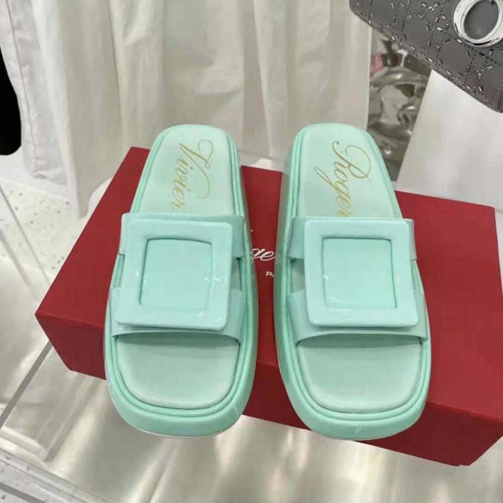 Roger Vivier Vivier Slide Covered Buckle Mules in Patent Leather for Women in Aqua Roger Vivier Vivier Slide Covered Buckle Mules in Patent Leather for Women in Aqua