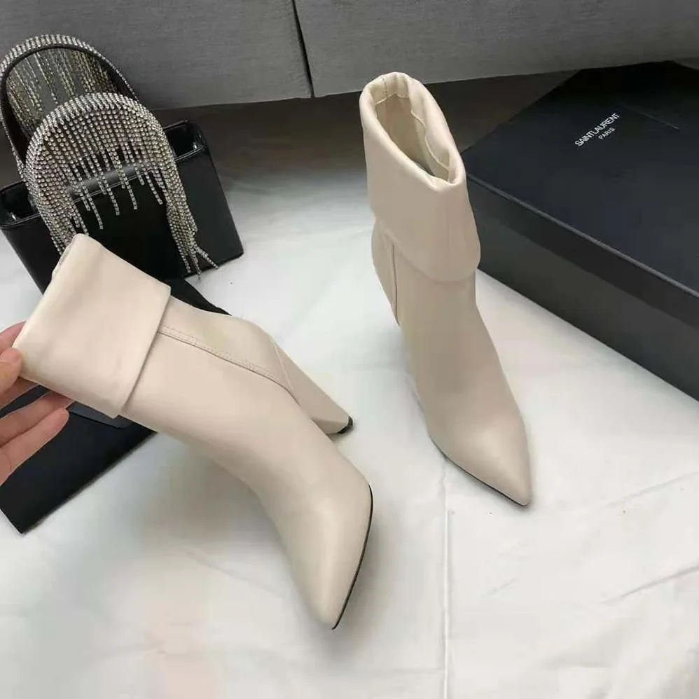 Saint Laurent YSL Niki Booties in Smooth Leather and Silver-Tone Monogram for Women in White Saint Laurent YSL Niki Booties in Smooth Leather and Silver-Tone Monogram for Women in White