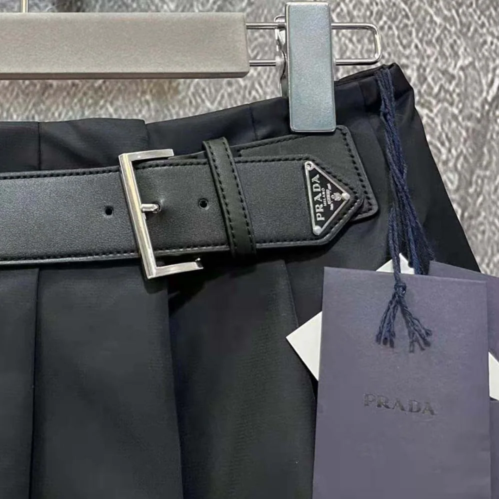 Prada Gabardine Miniskirt with Enameled Metal Triangle Logo for Women
