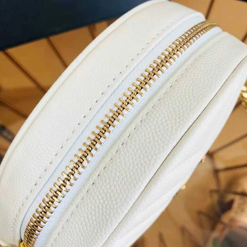 Saint Laurent YSL Vinyle Round Camera Bag in Chevron-Quilted Grain de Poudre Embossed Leather for Women in White