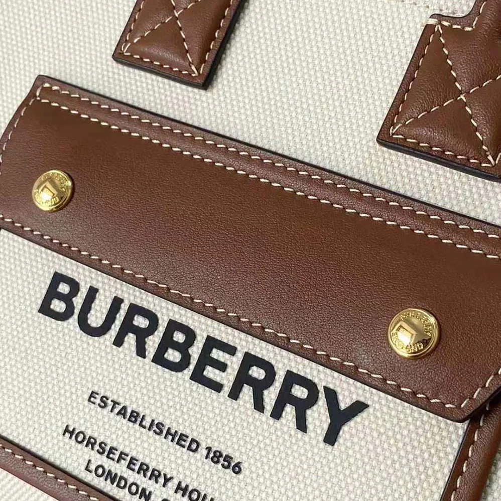 Burberry Mini Two-tone Canvas and Leather Freya Bag for Women in Brown Burberry Mini Two-tone Canvas and Leather Freya Bag for Women in Brown