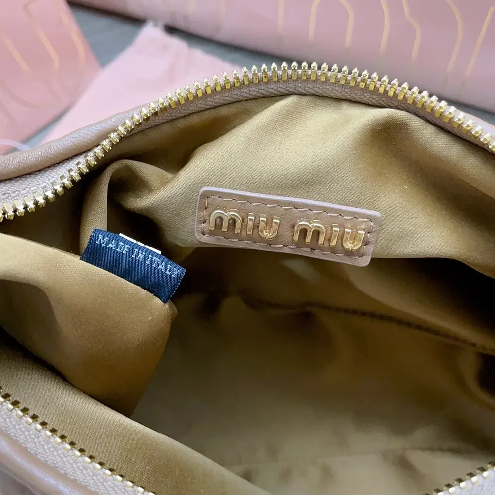 Miu Miu Wander Matelassé Nappa Leather Hobo Bag for Women in Caramel Miu Miu Wander Matelassé Nappa Leather Hobo Bag for Women in Caramel
