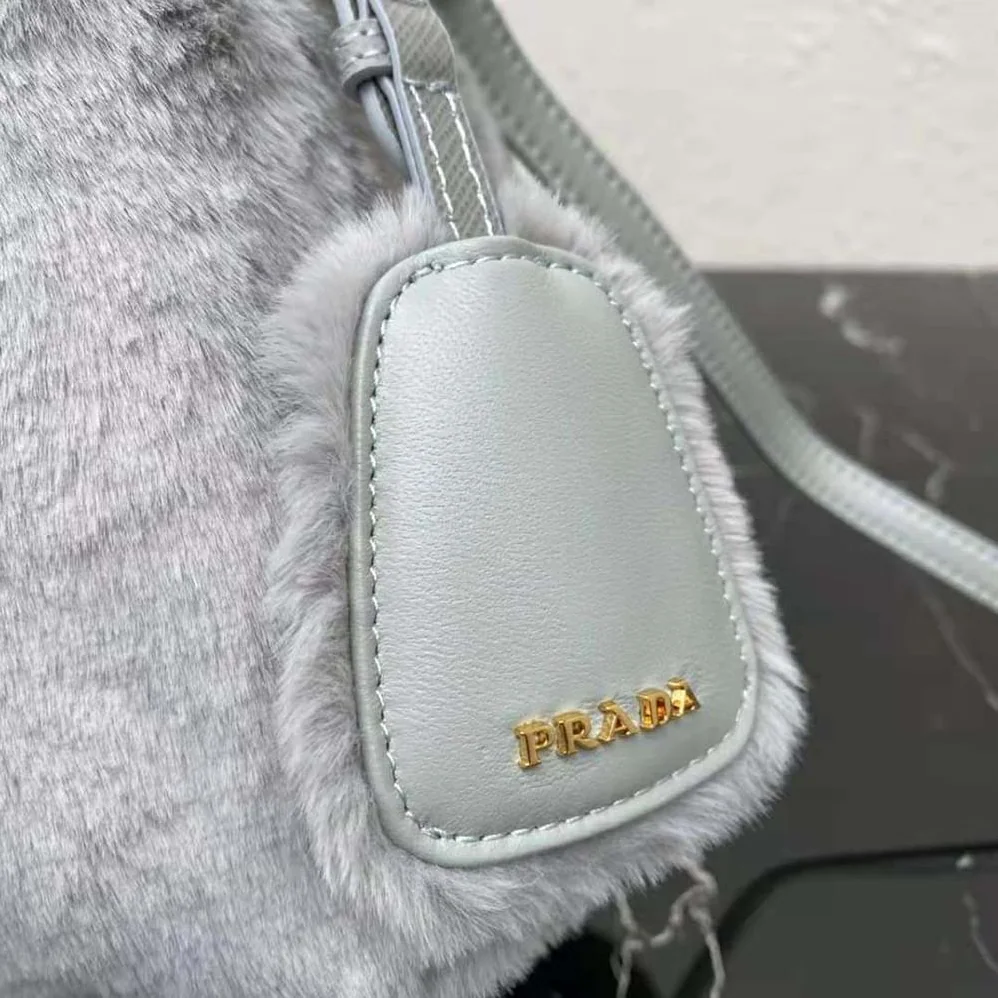 Prada Panier Shearling Mini-Bag for Women in Silver Prada Panier Shearling Mini-Bag for Women in Silver