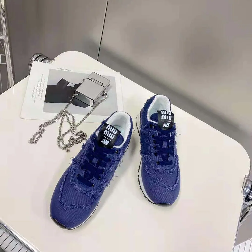 Miu Miu New Balance 574 x Miu Miu Denim Sneakers for Women in Navy Miu Miu New Balance 574 x Miu Miu Denim Sneakers for Women in Navy