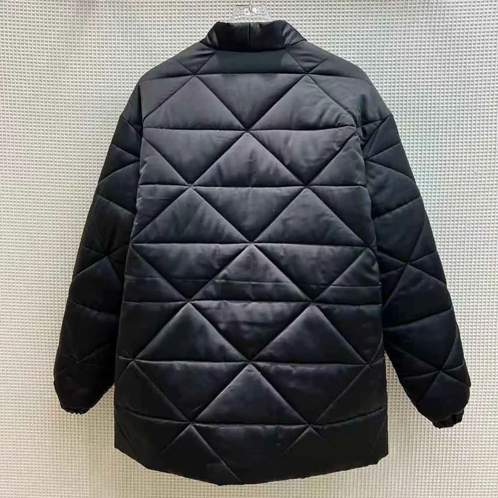 Prada Emblematic Triangle Quilted Re-Nylon Jacket for Women in Black Prada Emblematic Triangle Quilted Re-Nylon Jacket for Women in Black