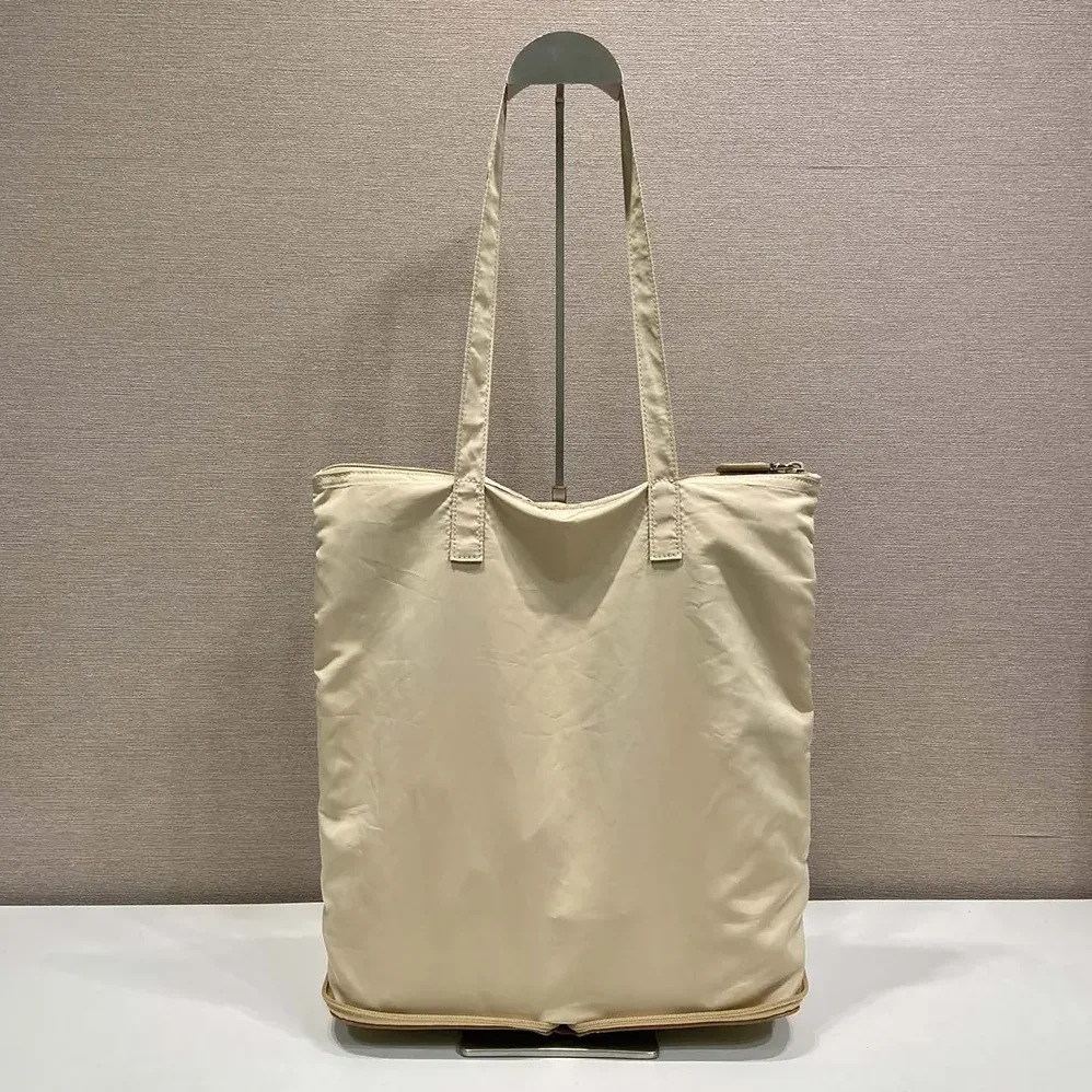 Prada Saffiano Leather Pendant With Re-Nylon Tote Bag for Women in Camel Brown Prada Saffiano Leather Pendant With Re-Nylon Tote Bag for Women in Camel Brown