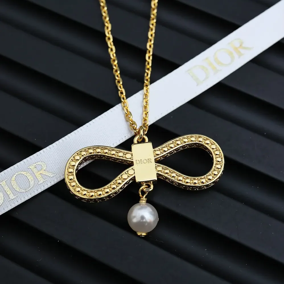 Dior Le Nœud de Dior Necklace Champagne-Finish Metal with a White Resin Pearl for Women Dior Le Nœud de Dior Necklace Champagne-Finish Metal with a White Resin Pearl for Women