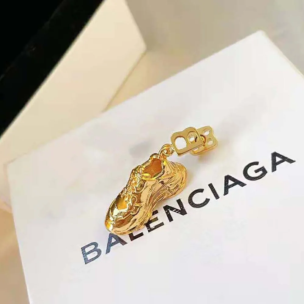 Balenciaga Mini Triple S Earring in Gold Bronze and Brass for Women Balenciaga Mini Triple S Earring in Gold Bronze and Brass for Women