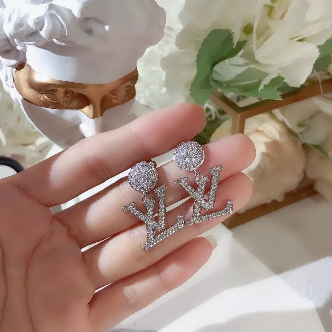 Louis Vuitton LV Iconic Twinkle Earrings Silver Tone Louis Vuitton LV Iconic Twinkle Earrings Silver Tone