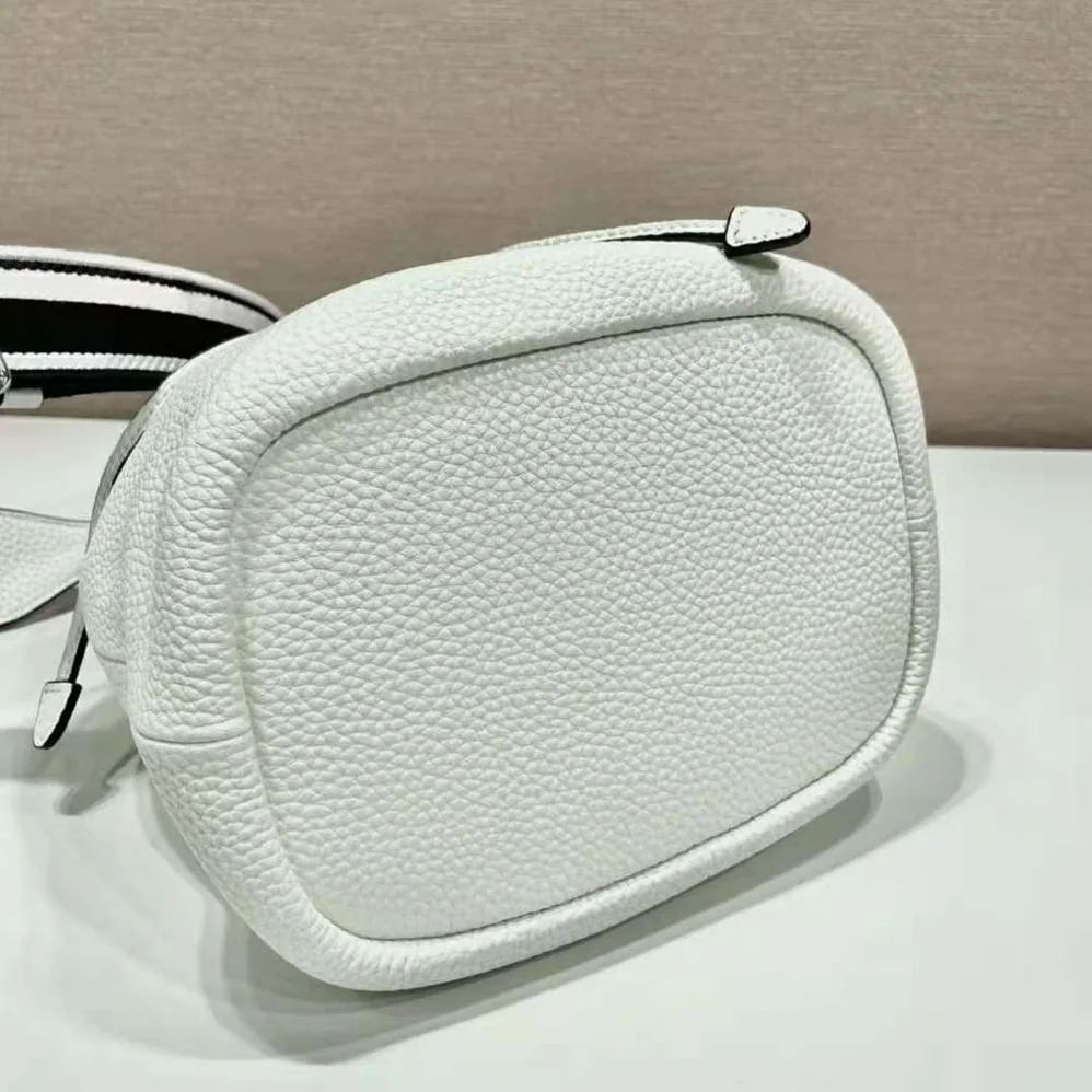 Prada Leather Bucket Bag with A Soft Silhouette for Women in White Prada Leather Bucket Bag with A Soft Silhouette for Women in White