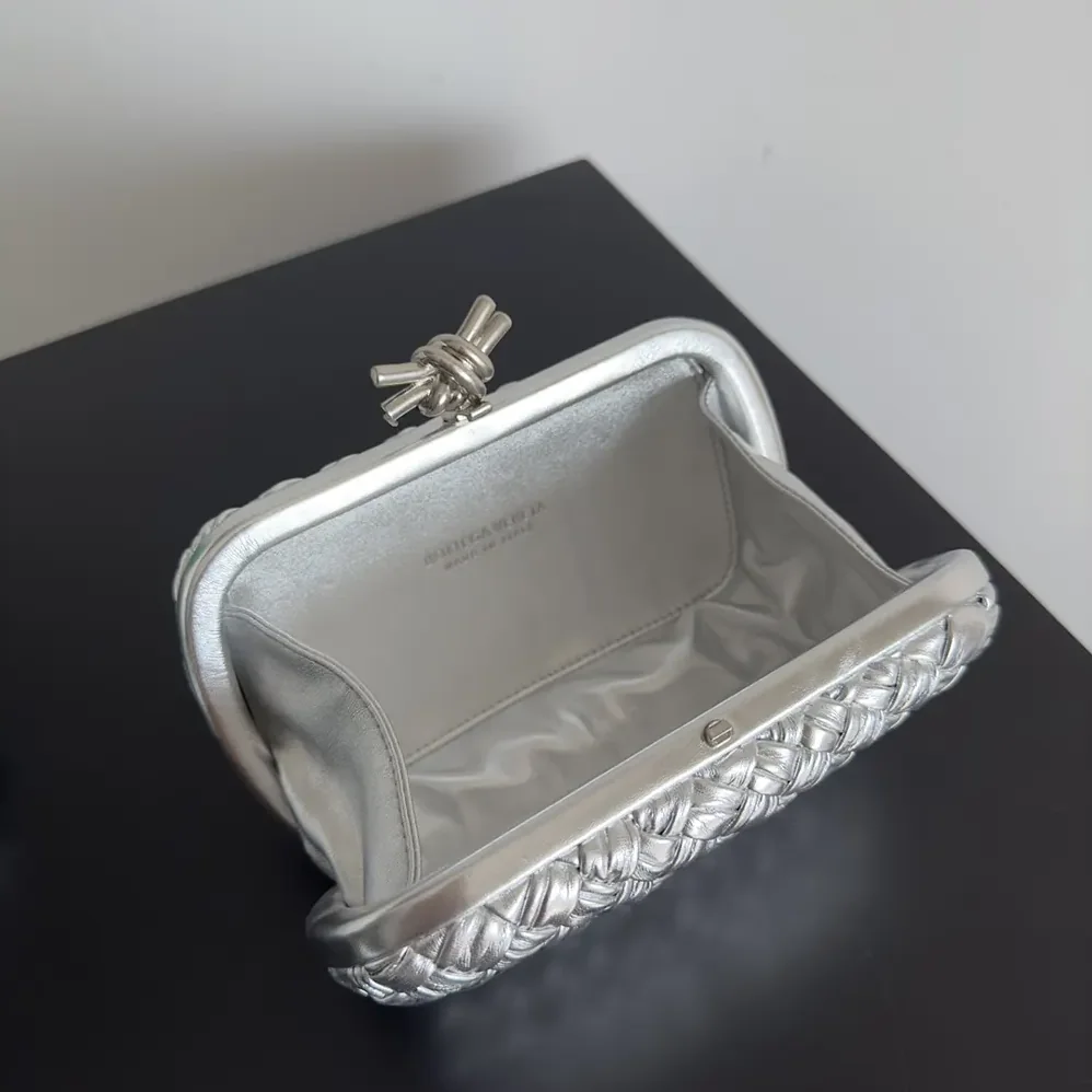 Bottega Veneta Knot Pressed Intreccio Laminated Leather Minaudiere for Women in Silver Bottega Veneta Knot Pressed Intreccio Laminated Leather Minaudiere for Women in Silver