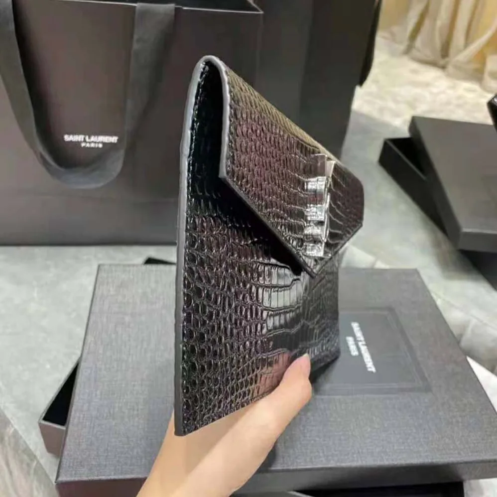 Saint Laurent YSL Uptown Pouch in Crocodile Embossed Shiny Leather for Women in Silver