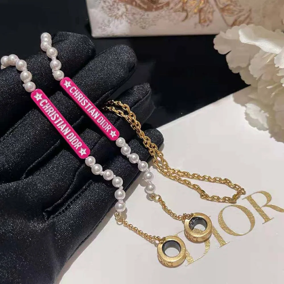 Dior D-Vibe Necklace for Headphones Gold-Finish Metal and White Resin Pearls for Women Dior D-Vibe Necklace for Headphones Gold-Finish Metal and White Resin Pearls for Women