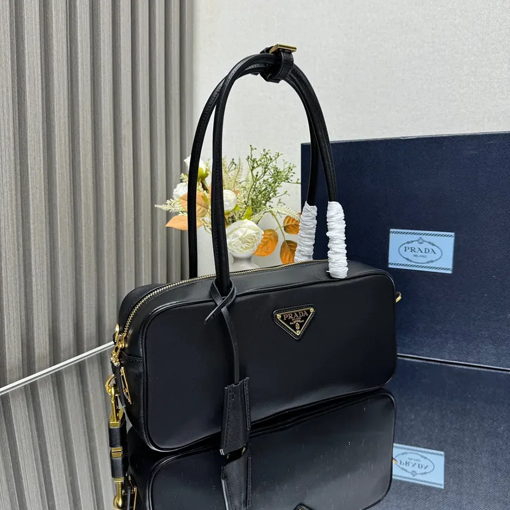 Prada Re-Nylon and Leather Small Top for Women in handle Bag with Padlock Prada Re-Nylon and Leather Small Top for Women in handle Bag with Padlock