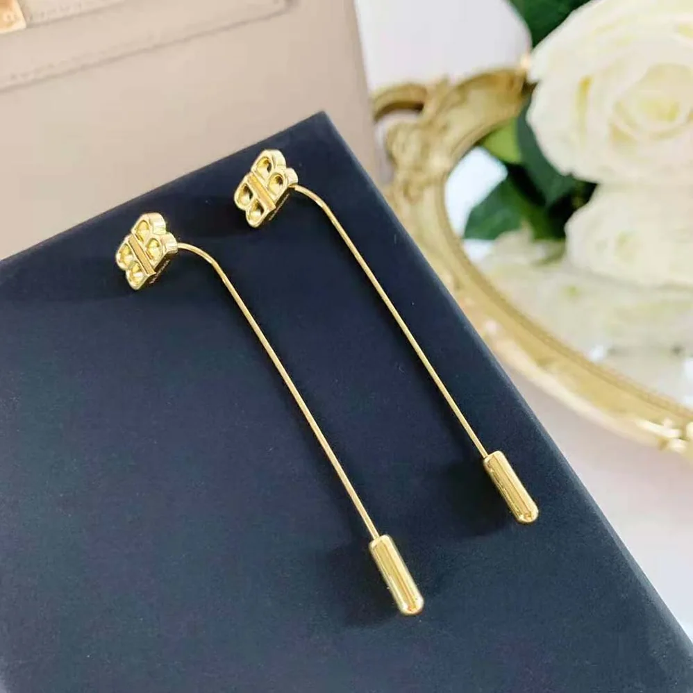 Balenciaga Pin BB Earrings in Shiny Gold Brass and Bronze for Women