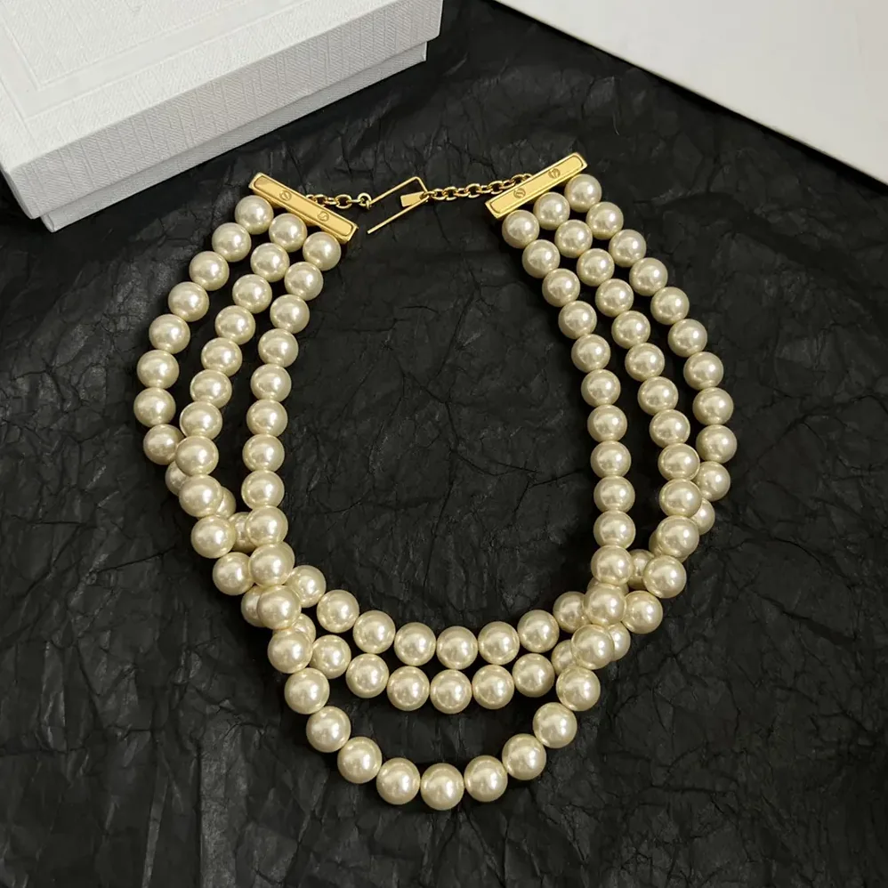 Celine Les Perles Celine Necklace in Resin Pearls Brass with Gold Finish and Steel for Women Celine Les Perles Celine Necklace in Resin Pearls Brass with Gold Finish and Steel for Women