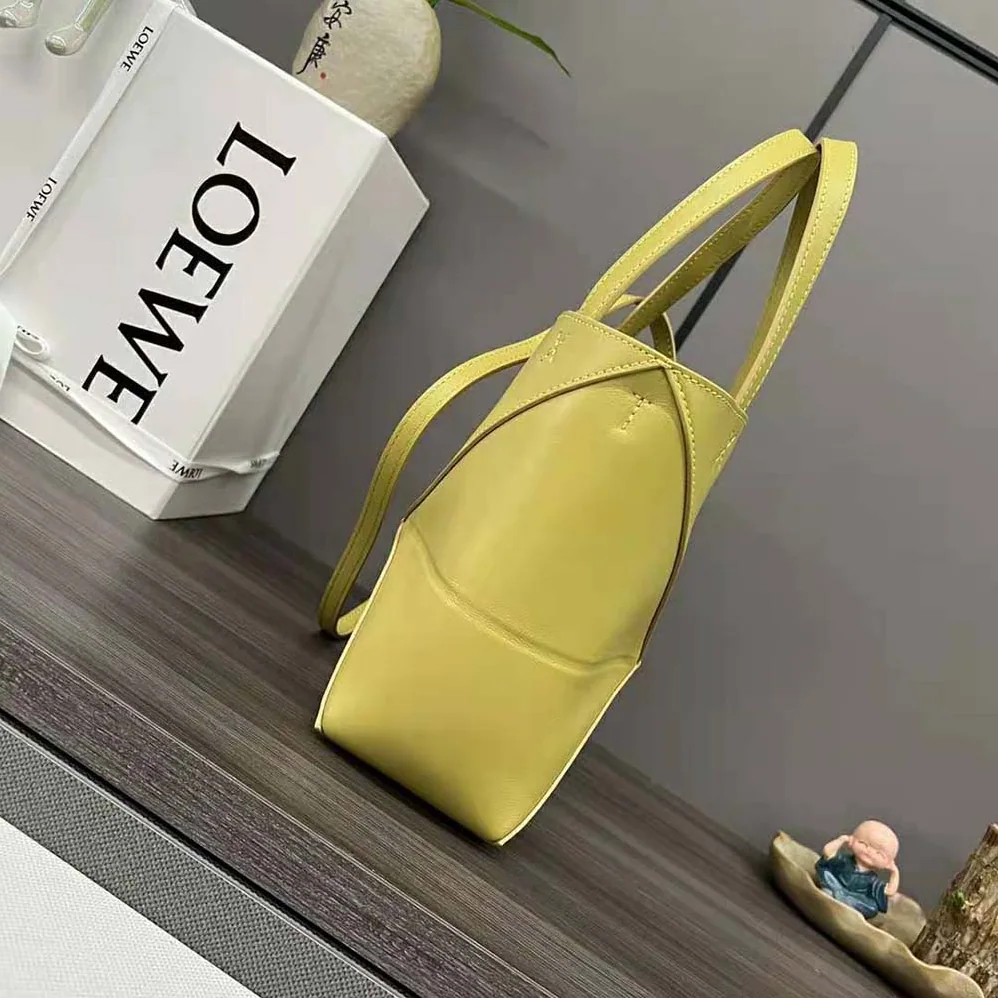 Loewe Mini Puzzle Fold Tote in Shiny Calfskin for Unisex in Yellow Loewe Mini Puzzle Fold Tote in Shiny Calfskin for Unisex in Yellow