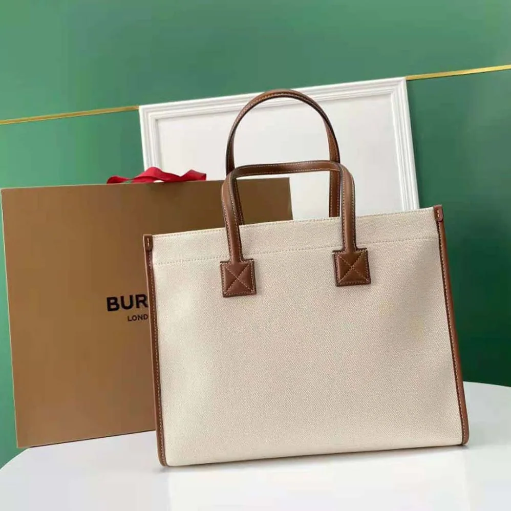Burberry Medium Two-tone Canvas and Leather Freya Tote for Women in Brown Burberry Medium Two-tone Canvas and Leather Freya Tote for Women in Brown