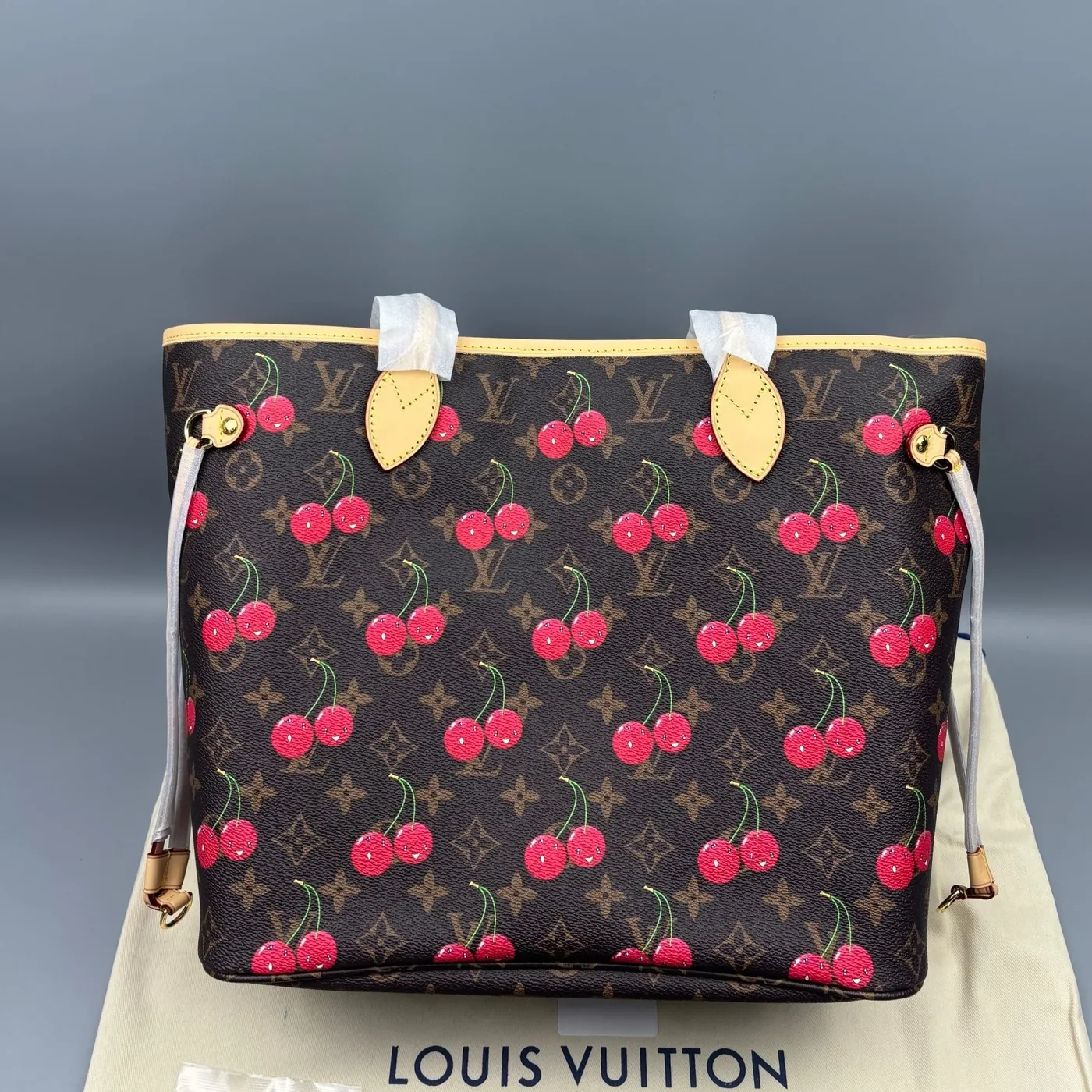 Louis Vuitton LV x TM Neverfull MM Tote Bag in Monogram Cherry Gold Hardware