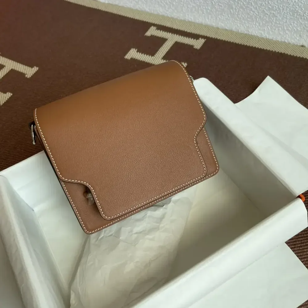 Hermes Roulis Mini Bag in Evercolor Calfskin for Women in Brown/Silver Hermes Roulis Mini Bag in Evercolor Calfskin for Women in Brown/Silver