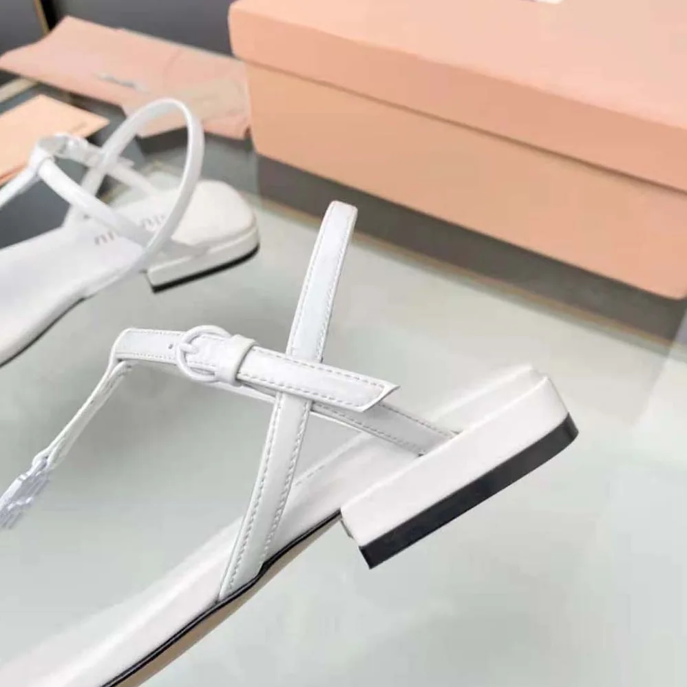 Miu Miu Patent Thong Sandals with Metal Lettering Logo for Women in White Miu Miu Patent Thong Sandals with Metal Lettering Logo for Women in White